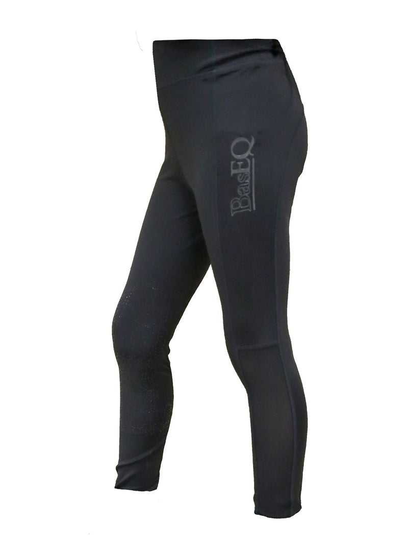 Side view of Black  BasEQ Dena Children's Knee Patch Tights One Stop Equine Shop